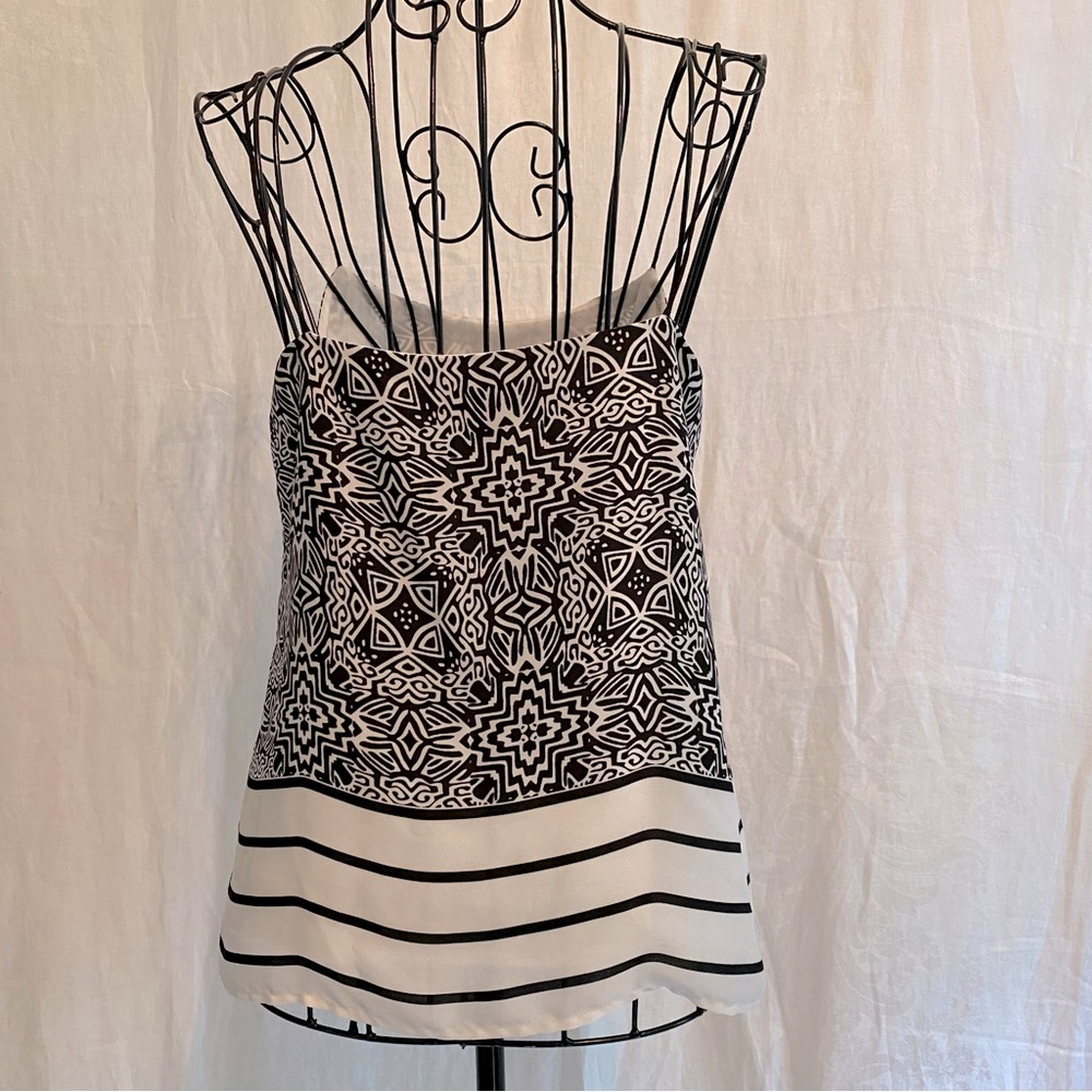 Banana Republic chiffon tank, size 0. Cute “string” sleeves.  Black/cream design